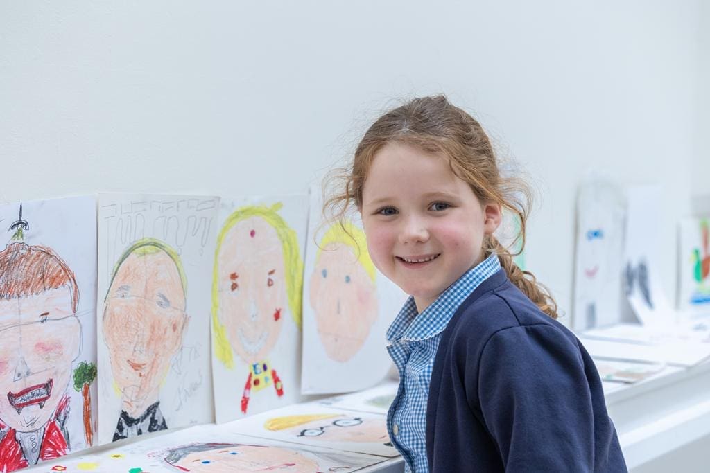 school pupil painting and drawing at Victoria Art Gallery in Bath on a school trip