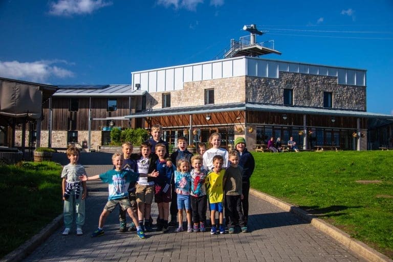 group of primary school students having a photo taken at Mount Cook residential centre