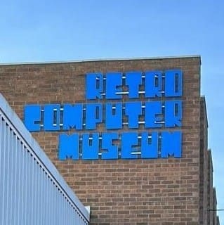 logo on side of building for retro computer museum