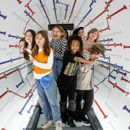 school students in a 3D interactive room at Paradox museum London