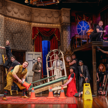 actors on stage of the play that goes wrong