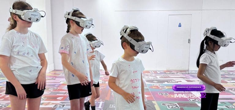 school group in a class with 4D headsets on