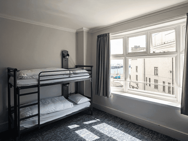 indoor dorm room with bunkbeds for school group accommodation