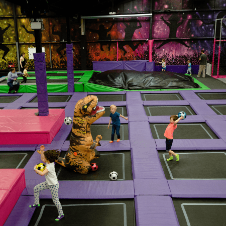 school pupils n trampolines at an indoor soft play centre