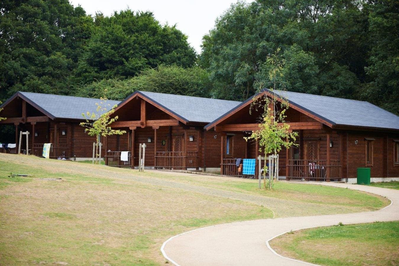 external drone shot of door lodge cabins