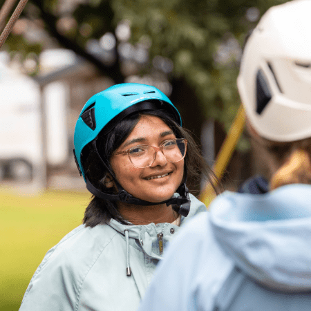 school pupils with safety hats and gear on ready to do outdoor activities