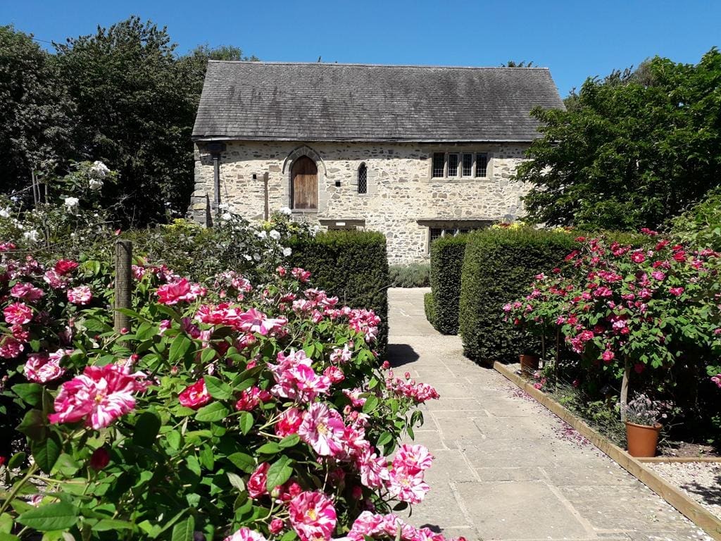The 1620s House and Garden Leicestershire 1 1620s outdoor house surrounded by flowers and trees