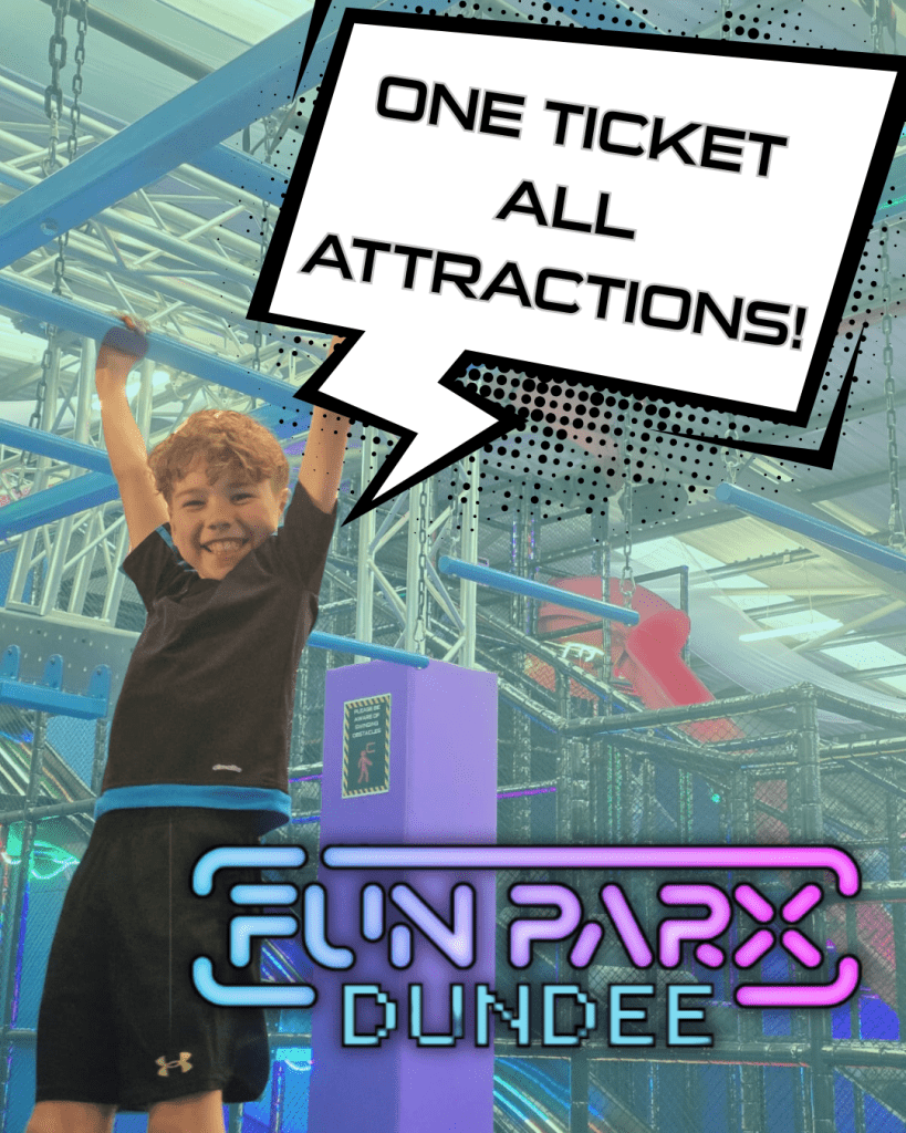 FunParx Indoor Adventure Centre Dundee 8 school pupil on high bars at an indoor adventure assault centre