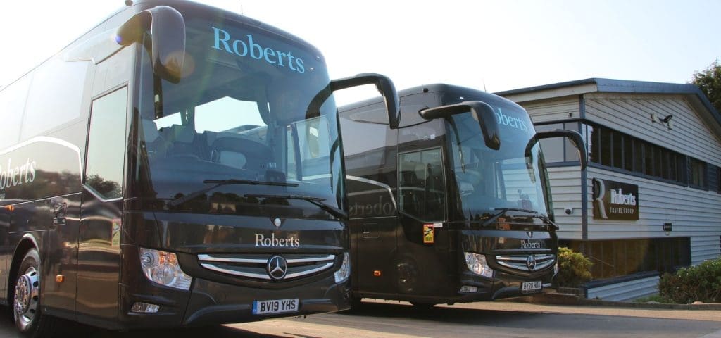 Roberts Travel Group Coach Hire for School Trips 9 two coaches parked next to the head office building of Roberts travel group