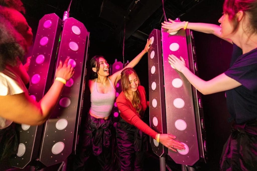 students at an indoor 3D immersive experience