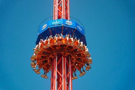school pupils on a theme park ride called the tower of doom