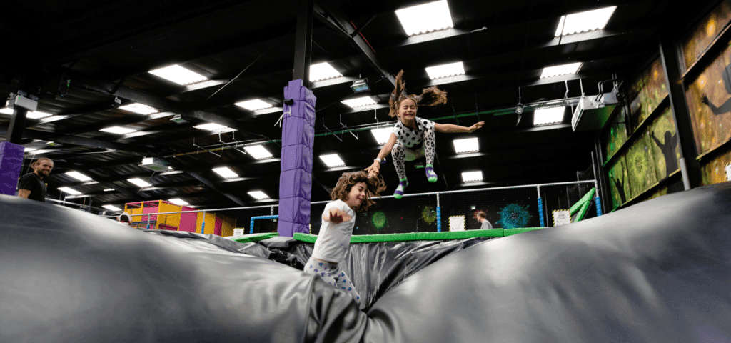 High Altitude Trampoline Park Norwich 9 primary school children on a large inflatable bouncy ball