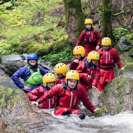 school group doing gorging activities in the lake district